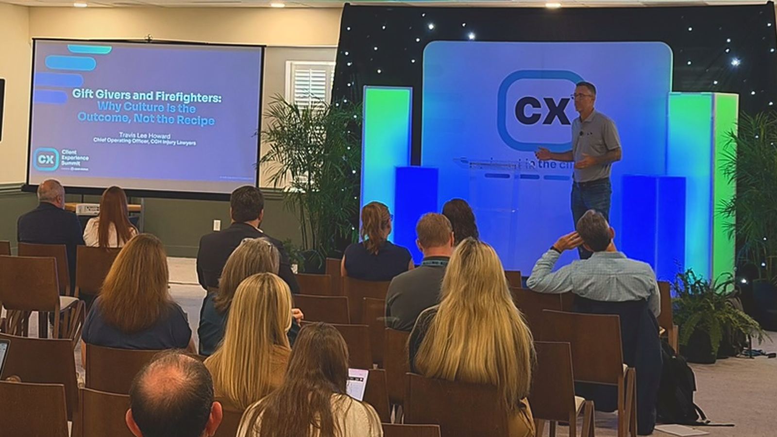 Travis Lee Howard leading a session in front of a room of firm leaders